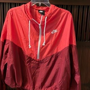 Kids Nike windbreaker with hood pull over.